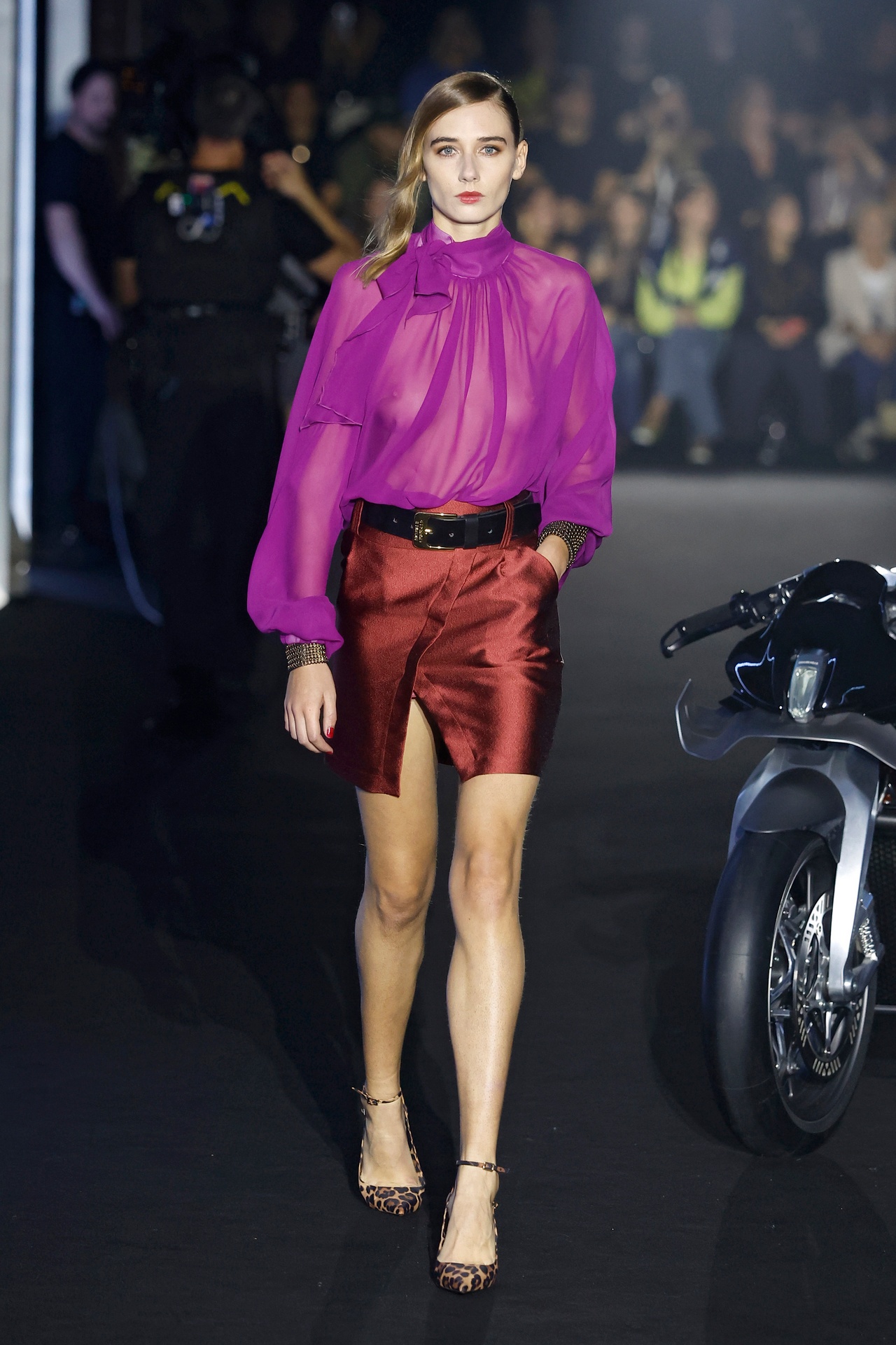 Runway look: magenta blouse and red satin skirt